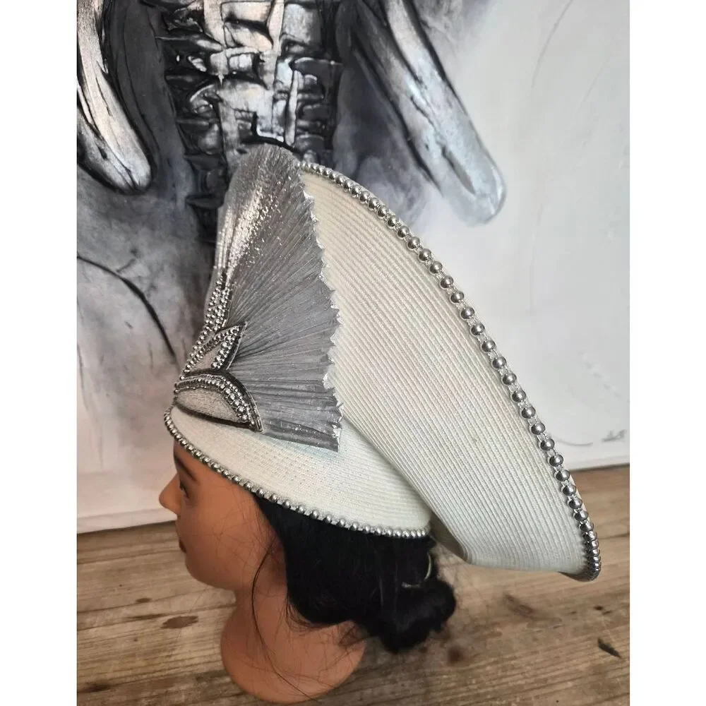Silver pleated facinator hat
